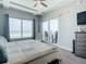 Main bedroom with king bed, ocean views, and access to balcony at 807 S Atlantic Ave # 302, New Smyrna Beach, FL 32169