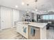 Kitchen island with sink and dishwasher at 807 S Atlantic Ave # 302, New Smyrna Beach, FL 32169