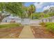 Charming home with a spacious backyard, storage shed, and walkway at 801 E 24Th Ave, New Smyrna Beach, FL 32169