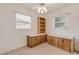 Bedroom with built-in shelving and wood cabinets at 801 E 24Th Ave, New Smyrna Beach, FL 32169