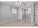 Bedroom with mirrored closet doors and light grey walls at 801 E 24Th Ave, New Smyrna Beach, FL 32169