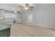 Spacious living room with built-in shelving and ceiling fans at 801 E 24Th Ave, New Smyrna Beach, FL 32169