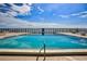 Inviting pool with ocean views and ample lounge space at 4139 S Atlantic Ave # B204, New Smyrna Beach, FL 32169