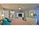 Spacious bedroom with white dresser and ceiling fan at 4139 S Atlantic Ave # B204, New Smyrna Beach, FL 32169