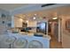 Modern kitchen with white cabinets and stainless steel appliances at 4139 S Atlantic Ave # B204, New Smyrna Beach, FL 32169