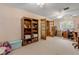 Bright home office with hardwood floors and french doors at 299 W Hickory Ave, Oak Hill, FL 32759