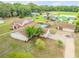 Two story home with a pool and detached garage at 299 W Hickory Ave, Oak Hill, FL 32759