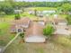 Two story home with a pool and detached garage at 299 W Hickory Ave, Oak Hill, FL 32759