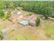 Single Gathering home with a pool and large backyard at 299 W Hickory Ave, Oak Hill, FL 32759