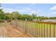 Wooden deck with backyard and treetop views at 299 W Hickory Ave, Oak Hill, FL 32759