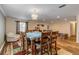 Spacious dining area with hardwood floors and a light and airy feel at 299 W Hickory Ave, Oak Hill, FL 32759