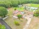 Two story home with a pool and detached garage at 299 W Hickory Ave, Oak Hill, FL 32759