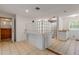 Bathroom with a glass block wall and a built-in vanity at 299 W Hickory Ave, Oak Hill, FL 32759