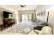 Spacious living room with tiled floors and access to a patio at 790 Pine Shores Cir, New Smyrna Beach, FL 32168