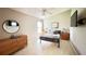Cozy bedroom with light flooring and modern dresser at 790 Pine Shores Cir, New Smyrna Beach, FL 32168