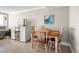 Charming dining area with wood table and ocean view at 2401 S Atlantic Ave # D304, New Smyrna Beach, FL 32169