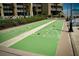 Enjoy outdoor shuffleboard at 2401 S Atlantic Ave # D304, New Smyrna Beach, FL 32169