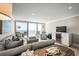 Bright living room, boasting an ocean view and stylish furniture at 2401 S Atlantic Ave # D304, New Smyrna Beach, FL 32169