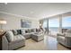 Spacious living room with ocean view and comfy seating at 2401 S Atlantic Ave # D304, New Smyrna Beach, FL 32169
