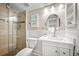 Clean bathroom with white vanity, toilet and shower at 2401 S Atlantic Ave # D304, New Smyrna Beach, FL 32169