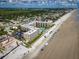 Beachfront property showcasing building location, parking, and beach views at 2401 S Atlantic Ave # D304, New Smyrna Beach, FL 32169