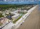 Beachfront property showcasing building location, parking, and beach views at 2401 S Atlantic Ave # D304, New Smyrna Beach, FL 32169