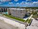 Oceanfront building, unit D304, highlighting beach access and pool area at 2401 S Atlantic Ave # D304, New Smyrna Beach, FL 32169