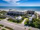 Oceanfront building with spacious parking, landscaping, and beach access at 2401 S Atlantic Ave # D304, New Smyrna Beach, FL 32169