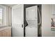 Stackable washer and dryer in a closet at 2401 S Atlantic Ave # D304, New Smyrna Beach, FL 32169