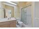 Clean bathroom with shower/tub combo, vanity, and toilet at 6368 S Atlantic Ave, New Smyrna Beach, FL 32169