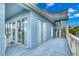 Large deck with stairs leading to upper level at 6368 S Atlantic Ave, New Smyrna Beach, FL 32169