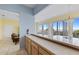 Kitchen with breakfast bar and ocean view at 6368 S Atlantic Ave, New Smyrna Beach, FL 32169