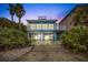 Two-story beach house with parking and ocean views at 6368 S Atlantic Ave, New Smyrna Beach, FL 32169