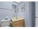 Small bathroom with vanity and toilet at 6368 S Atlantic Ave, New Smyrna Beach, FL 32169