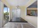Dining room with table and chairs, plus sliding doors to balcony at 6368 S Atlantic Ave, New Smyrna Beach, FL 32169
