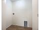 Laundry area with hookups and built-in storage at 521 Mount Olympus Blvd, New Smyrna Beach, FL 32168