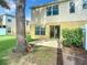 Small patio and grassy backyard with privacy at 521 Mount Olympus Blvd, New Smyrna Beach, FL 32168