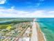 Aerial view showcasing the property's prime coastal location and beach proximity at 51 Sun Dunes Cir, Ponce Inlet, FL 32127