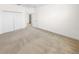 Large bedroom with double door closet and carpet flooring at 51 Sun Dunes Cir, Ponce Inlet, FL 32127