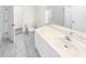 Clean bathroom with double vanity and tile flooring at 51 Sun Dunes Cir, Ponce Inlet, FL 32127