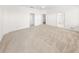 Spacious bedroom with plush carpeting and ample closet space at 51 Sun Dunes Cir, Ponce Inlet, FL 32127