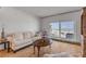 Living room with ocean view and hardwood floors at 1111 Hill St # U3, New Smyrna Beach, FL 32169