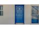 Blue front door leading into condo unit at 1111 Hill St # U3, New Smyrna Beach, FL 32169