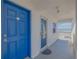 Blue door to condo with ocean view from balcony at 1111 Hill St # U3, New Smyrna Beach, FL 32169