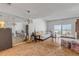 Spacious living room with ocean view and hardwood floors at 1111 Hill St # U3, New Smyrna Beach, FL 32169