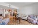 Living room, kitchen view, and parquet flooring at 1111 Hill St # U3, New Smyrna Beach, FL 32169