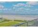 Beautiful ocean view from condo balcony with lush landscaping at 1111 Hill St # U3, New Smyrna Beach, FL 32169