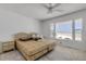 Bedroom with ocean view, double bed, and small nightstands at 1111 Hill St # U3, New Smyrna Beach, FL 32169