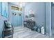 Spacious entryway with light blue doors and a console table at 113 Via Benevento, New Smyrna Beach, FL 32169