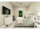 Bright bedroom with a comfortable bed and plenty of natural light at 113 Via Benevento, New Smyrna Beach, FL 32169